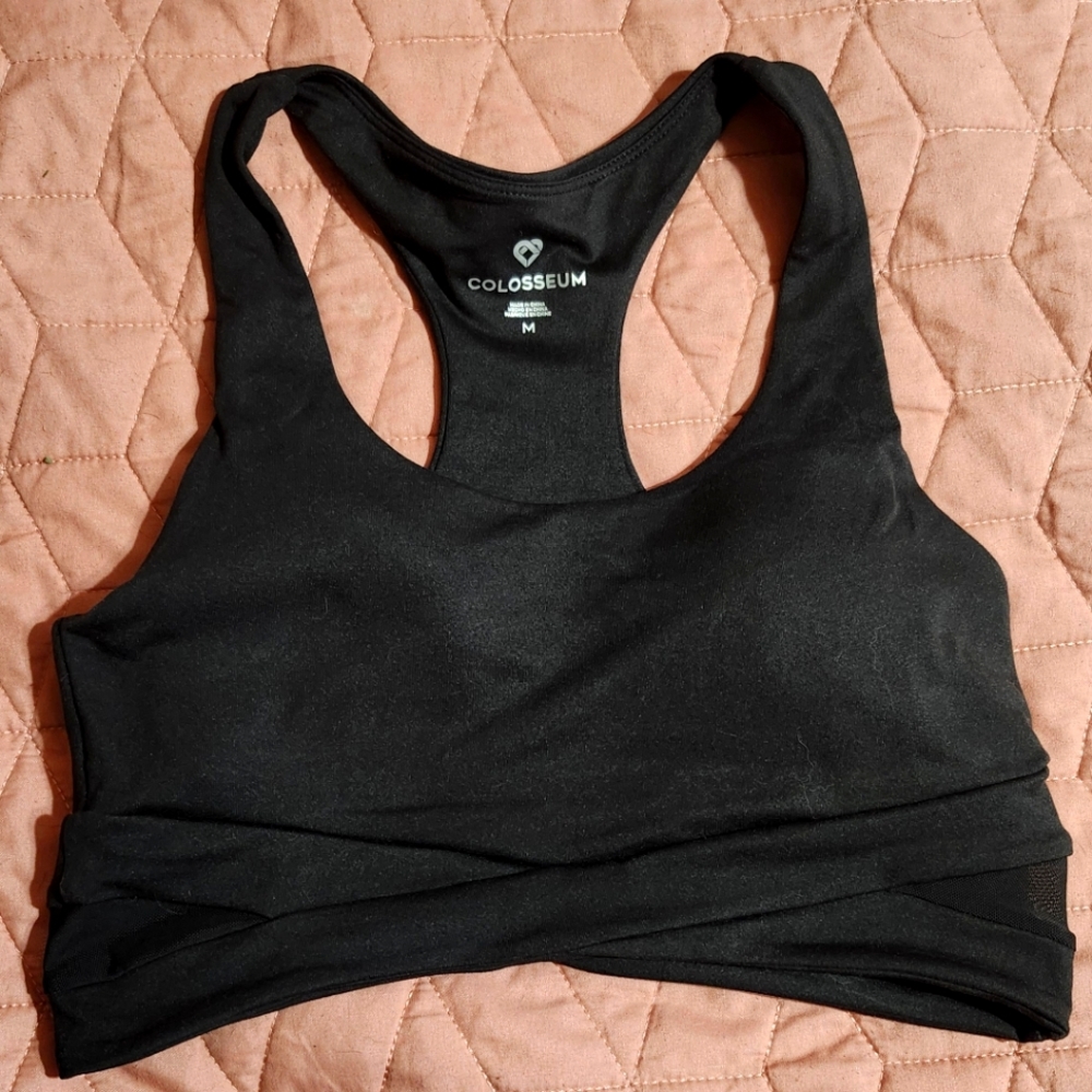NEVER WORN Colosseum sports bra size M with mesh detail and crossed elastic band